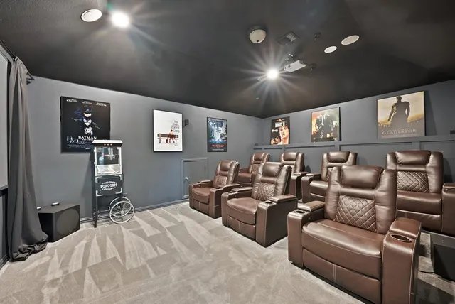 a bathroom with a toilet and a shower curtain