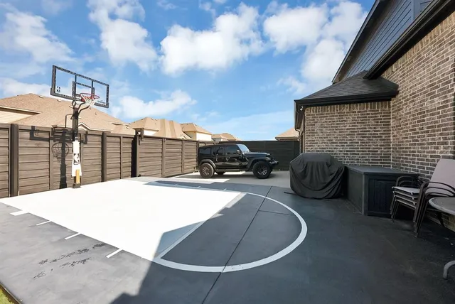 a view of a patio with couches chairs and potted plants