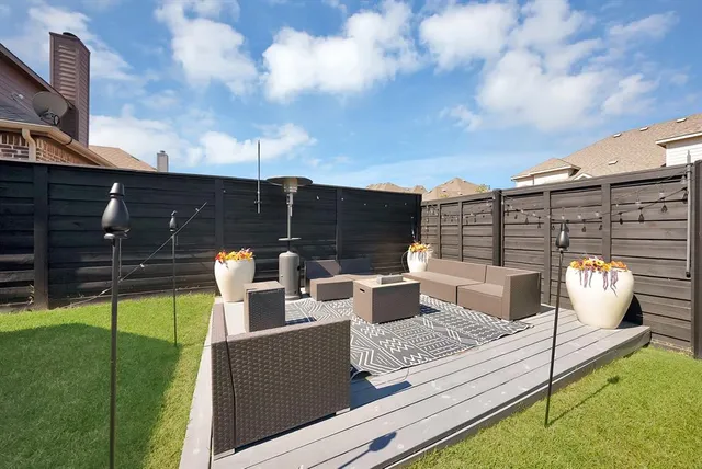 a swimming pool with barbeque oven in front of it