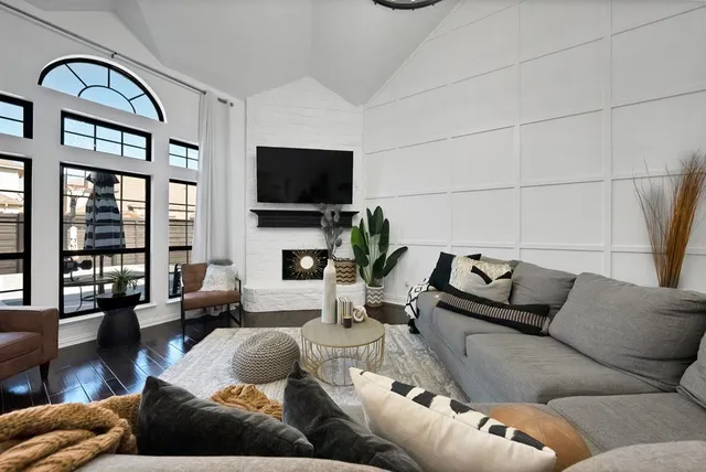 a living room with furniture or couch and a flat screen tv