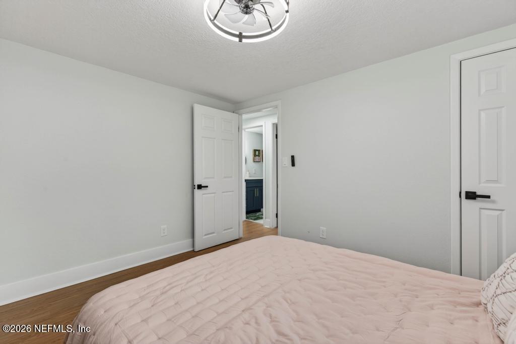 43739 Ratliff Road Callahan, FL 32011 - Photo 43 of 55 a bedroom with a bed and cabinets