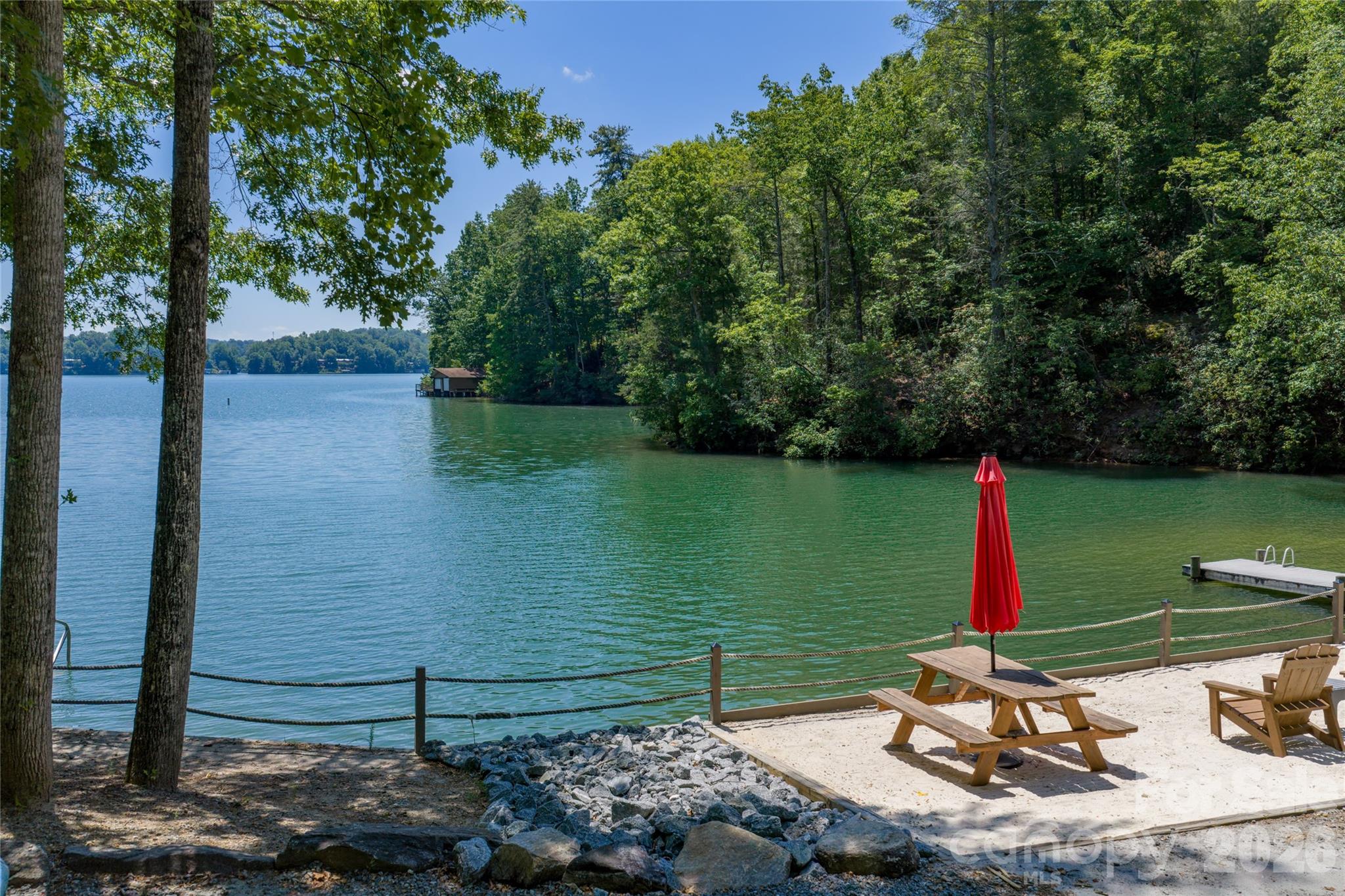 0 View Trail Lake Lure, NC 28746 - Photo 6 of 11 a view of a lake with a park