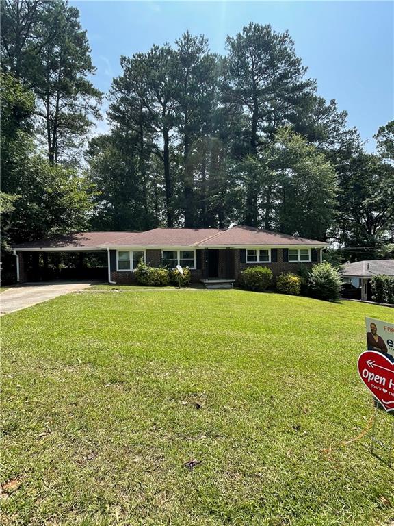 2575 Clifton Springs Manor Decatur, GA 30034 - Photo 1 of 1 a view of green field with trees in the background