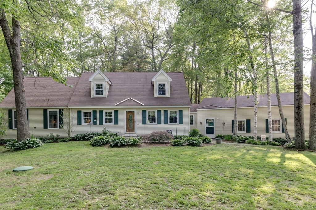 50 Kienia Road Hudson, NH 03051 - Photo 2 of 42 a front view of a house with garden