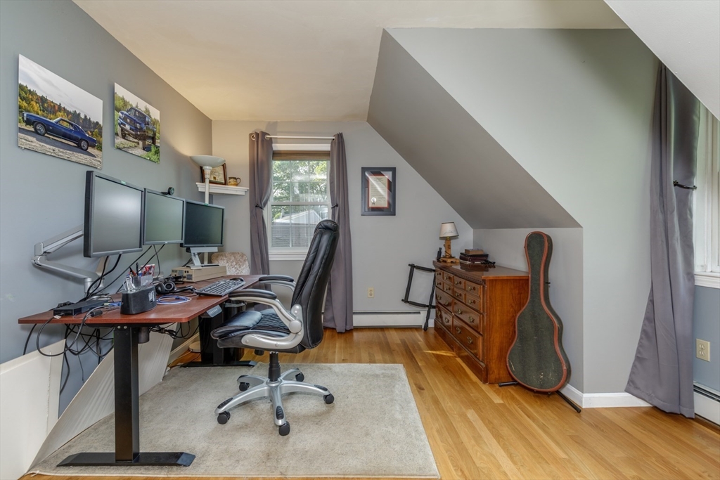 50 Kienia Road Hudson, NH 03051 - Photo 25 of 42 a view of a workspace with furniture and a window