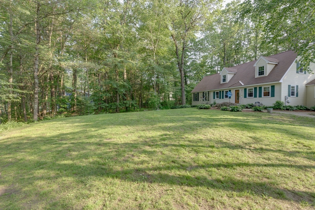 50 Kienia Road Hudson, NH 03051 - Photo 42 of 42 a front view of a house with a yard