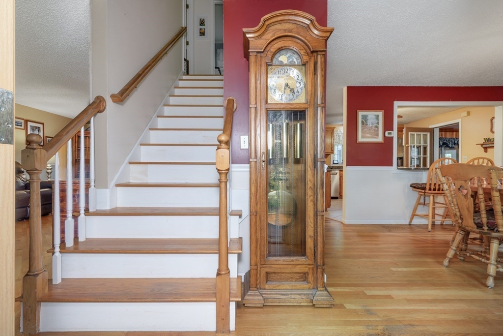50 Kienia Road Hudson, NH 03051 - Photo 6 of 42 a view of entryway and hall with wooden floor