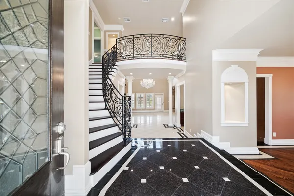 a view of entryway with wooden floor