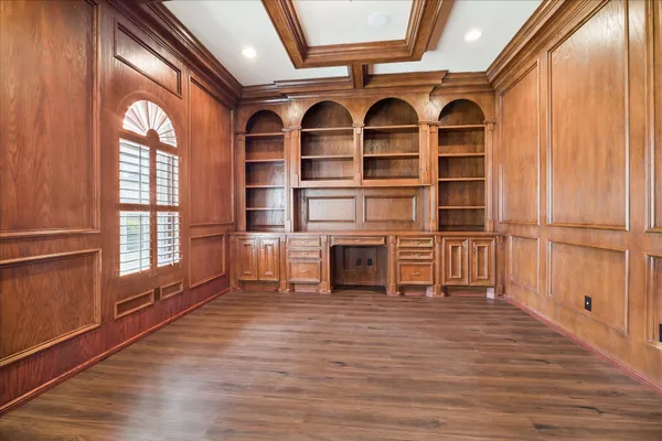 a view of front door with wooden floor