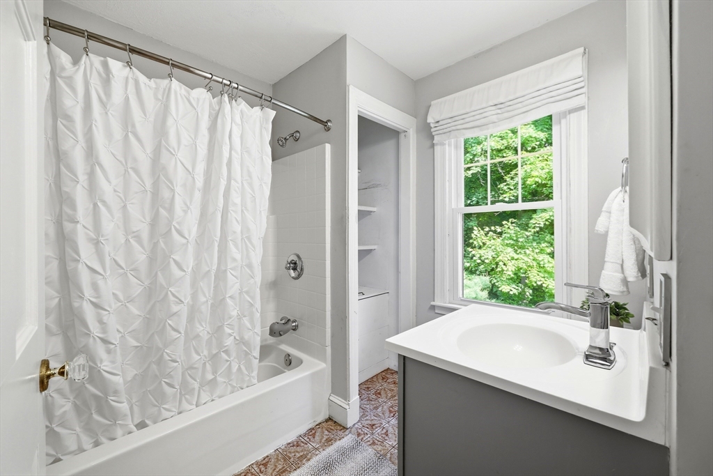 32 Lincoln Road Longmeadow, MA 01106 - Photo 25 of 36 a bathroom with a sink and a bathtub