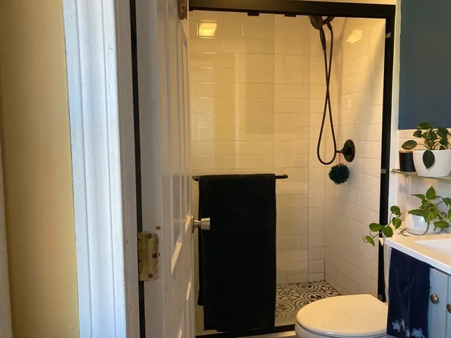 a bathroom with a sink and toilet