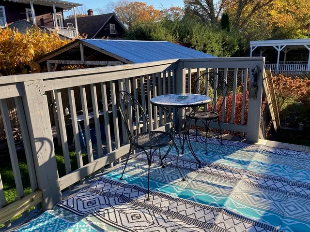 a view of a chairs and table in the patio