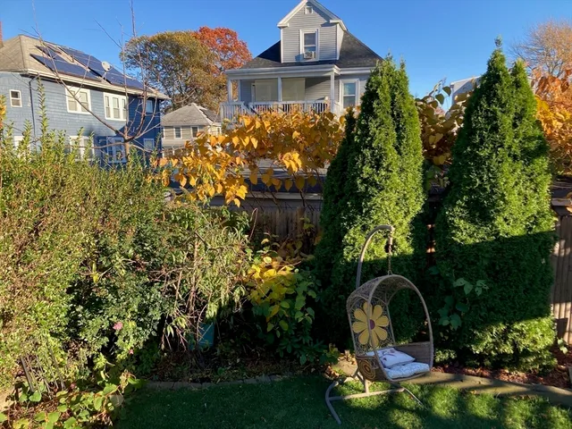 a backyard of a house with lots of green space
