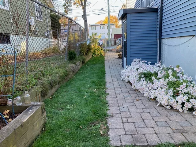 a view of a back yard of the house