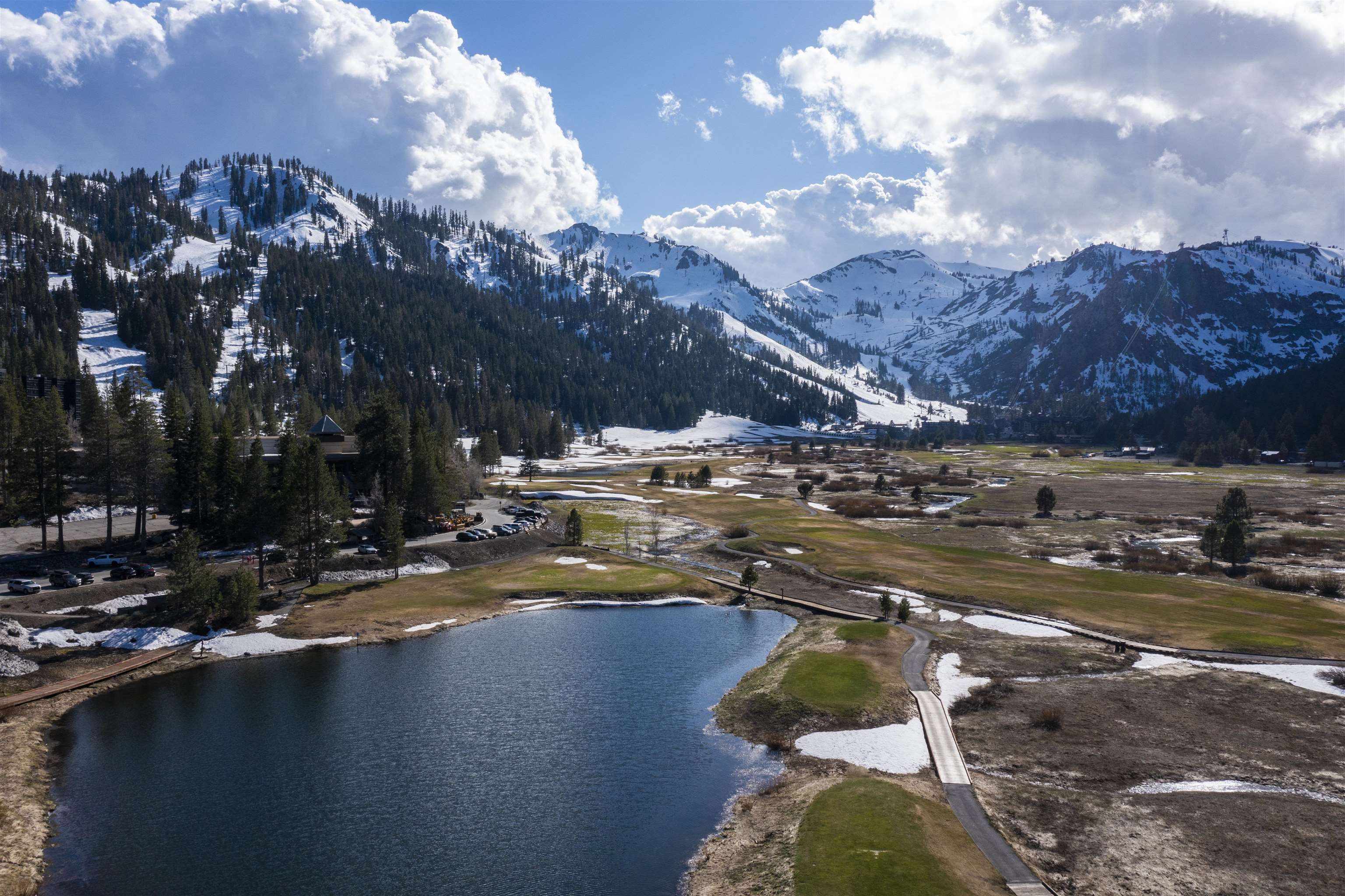400 Resort Road, Unit 932 Olympic Valley, CA 96146 - Photo 16 of 24 a view of a lake in middle of the town