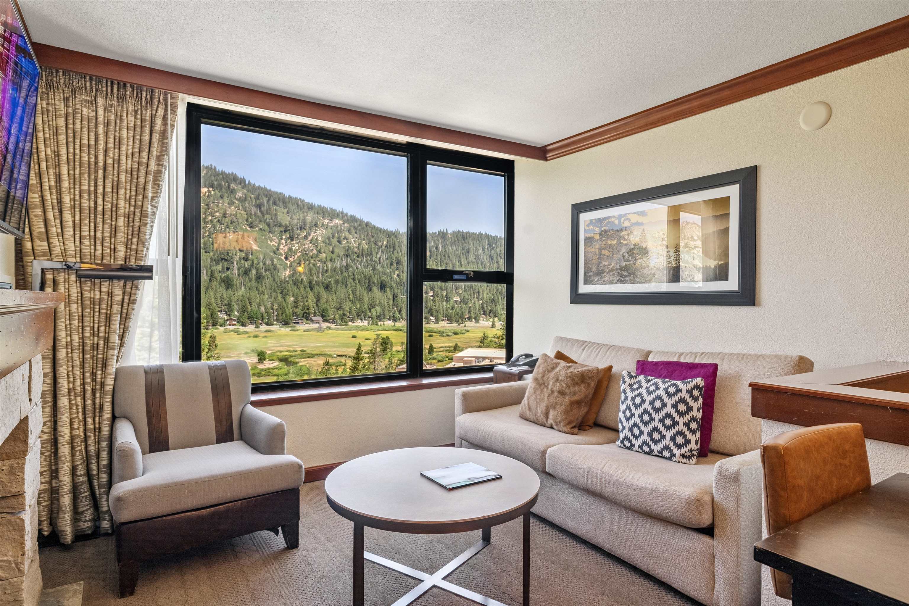 400 Resort Road, Unit 932 Olympic Valley, CA 96146 - Photo 3 of 24 a living room with furniture and a large window