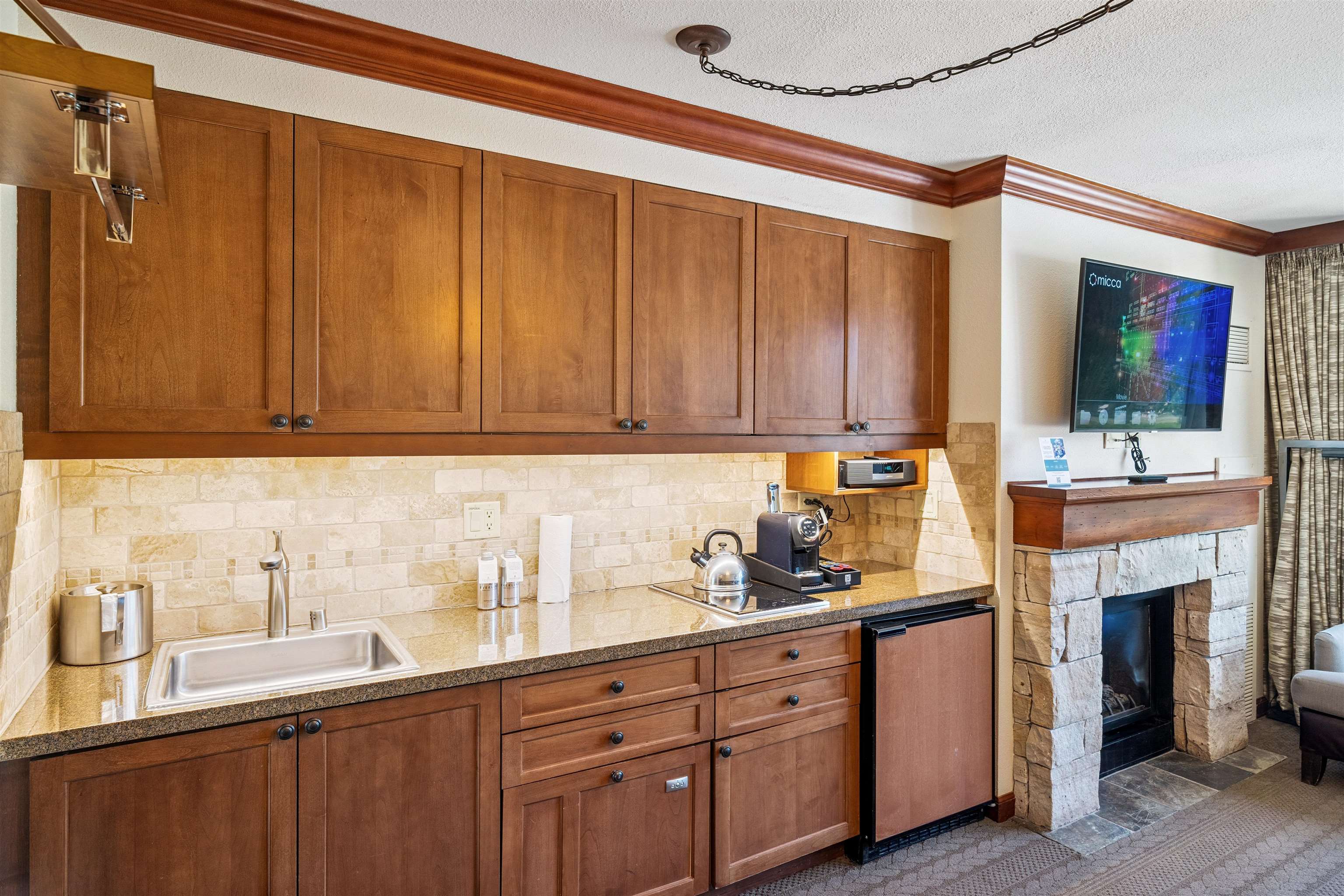 400 Resort Road, Unit 932 Olympic Valley, CA 96146 - Photo 6 of 24 a kitchen with stainless steel appliances granite countertop a sink a stove and cabinets