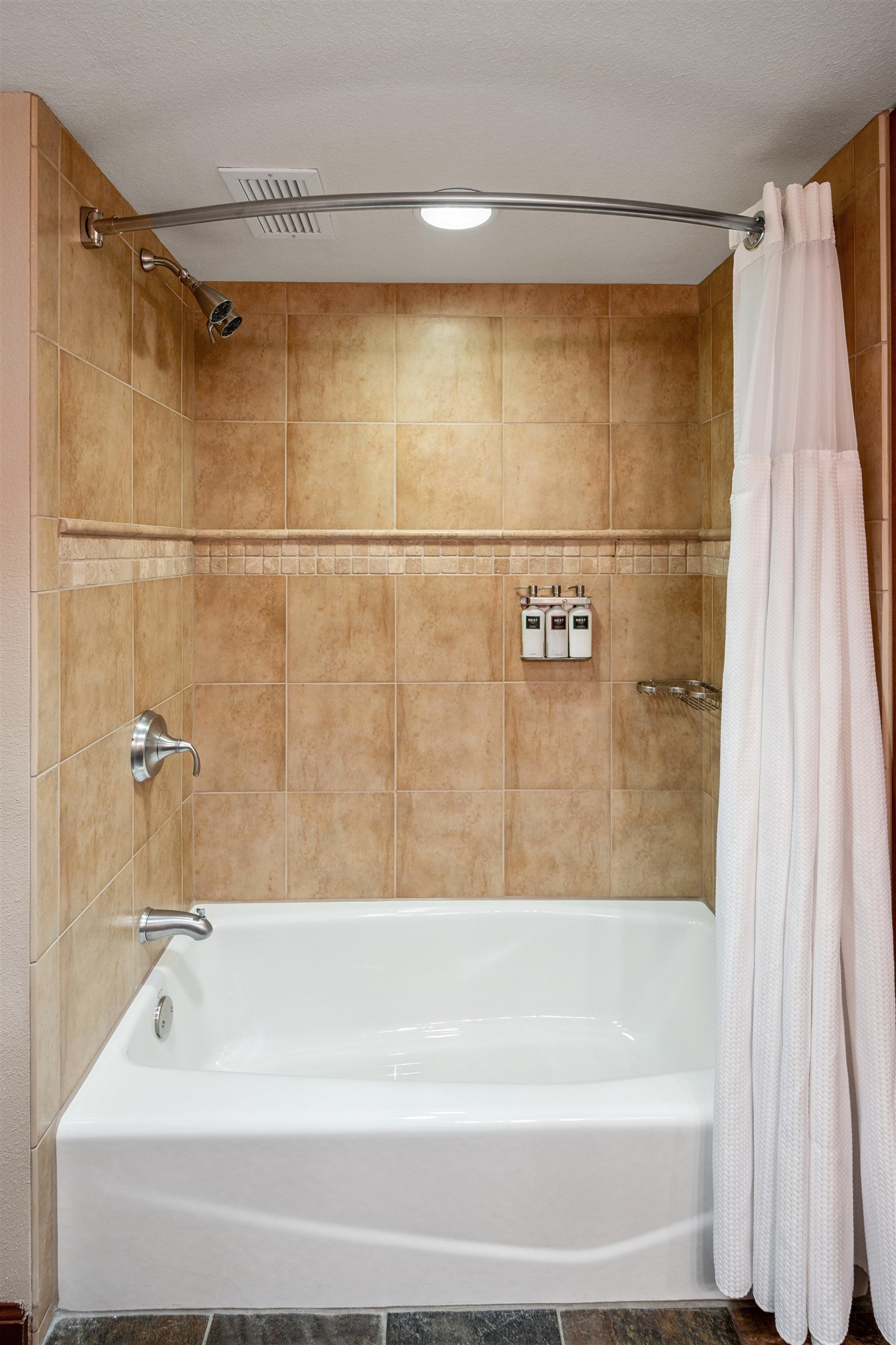 400 Resort Road, Unit 932 Olympic Valley, CA 96146 - Photo 9 of 24 a bathroom with a shower and a bath tub