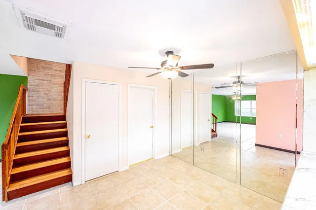 a kitchen with a refrigerator sink and stove