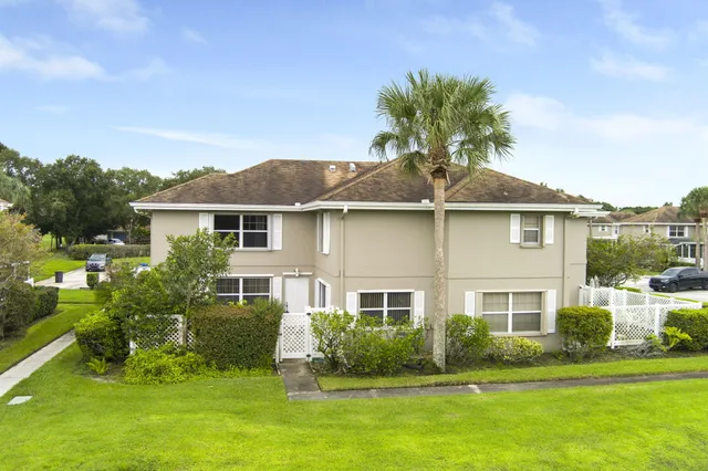 a view of a swimming pool and a yard