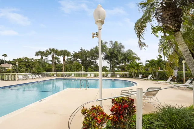 a front view of a house with a large window
