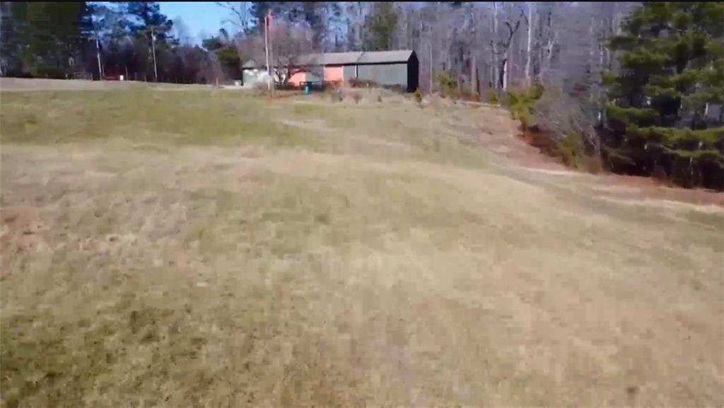 834 Arnold Mill Road Woodstock, GA 30188 - Photo 6 of 10 a backyard of a house