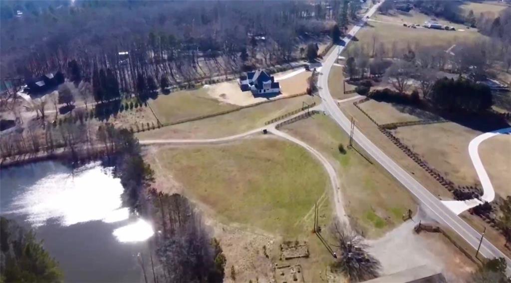 834 Arnold Mill Road Woodstock, GA 30188 - Photo 7 of 10 a view of a swimming pool with sitting area
