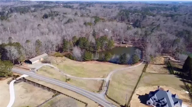 a picture of bed room with furniture