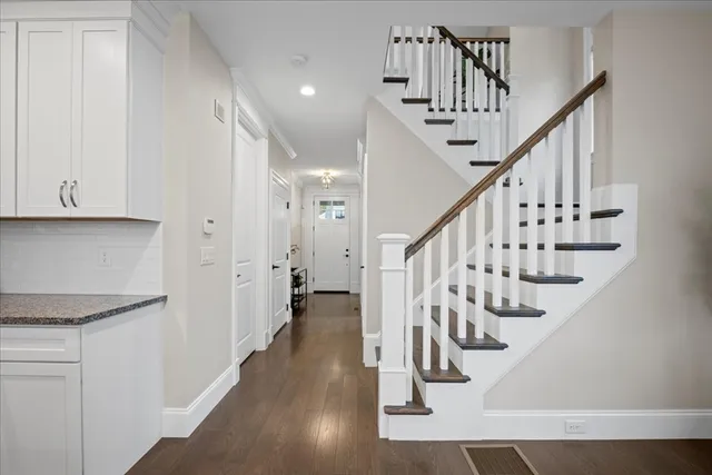 a view of entryway with wooden floor
