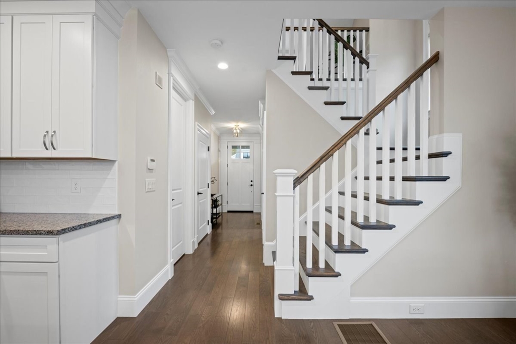 9 Hawk Lane, Unit 28 Framingham, MA 01701 - Photo 17 of 37 a view of entryway with wooden floor