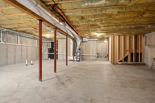 a view of an empty room with a garage