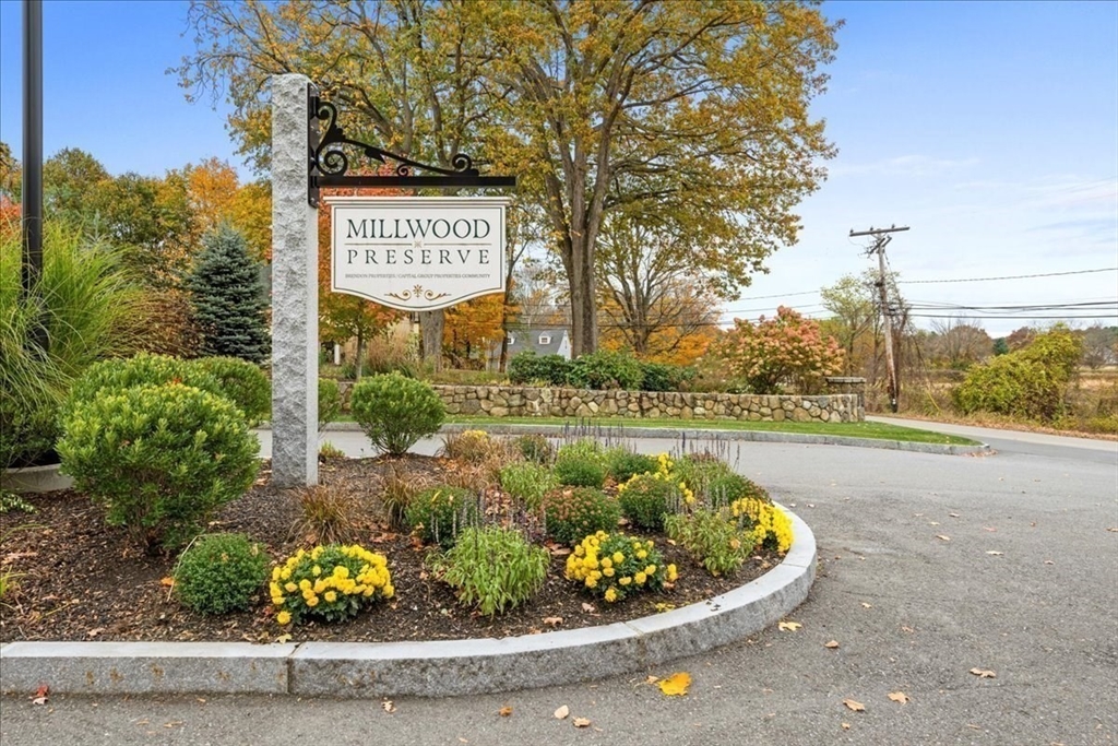 9 Hawk Lane, Unit 28 Framingham, MA 01701 - Photo 33 of 37 a view of a street with potted plants