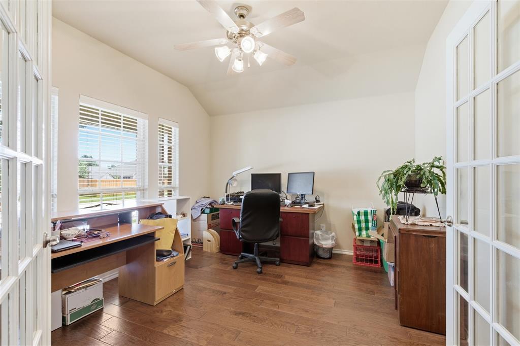 5491 Exeter Drive Prosper, TX 75078 - Photo 11 of 20 a view of a workspace with furniture and a window