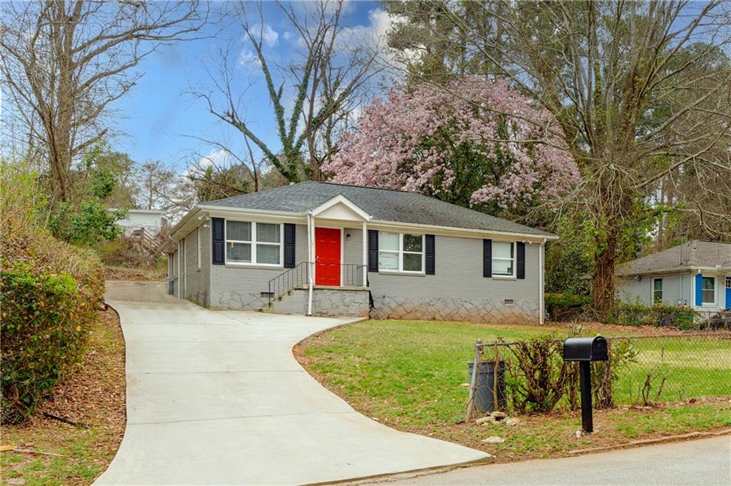 1545 Columbia Circle Decatur, GA 30032 - Photo 1 of 1 a front view of a house with a yard