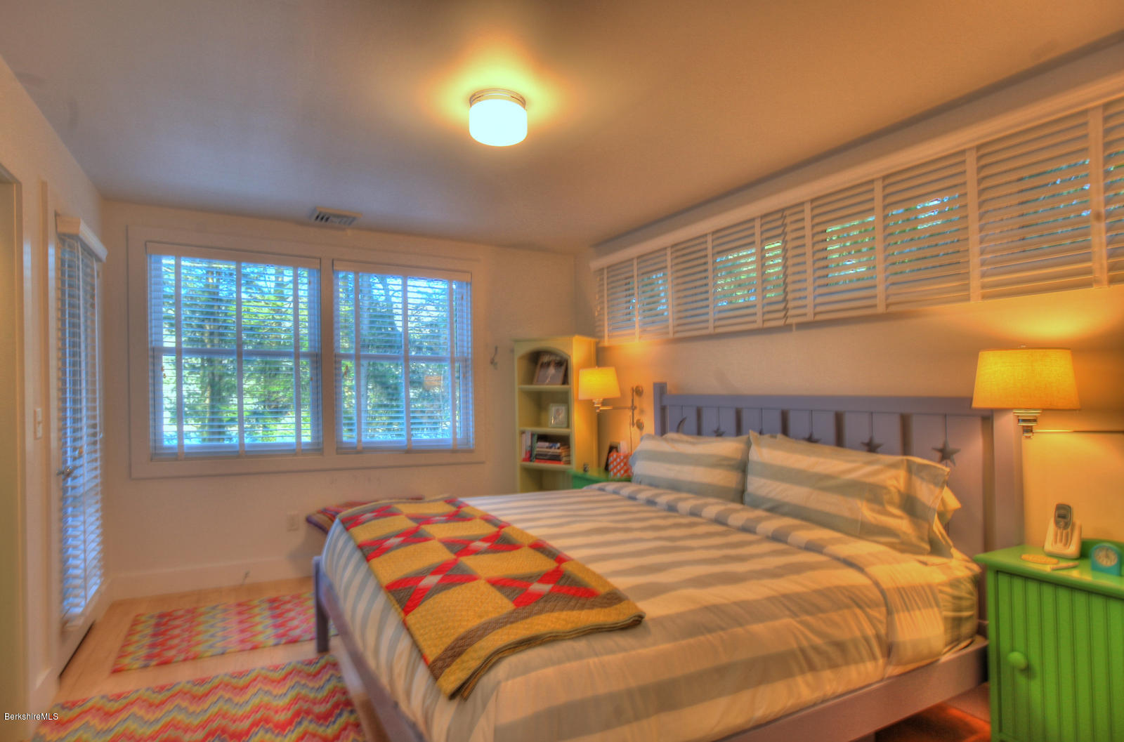 34 Bidwell Road Monterey, MA 01245 - Photo 18 of 37 a bedroom with a bed and a window