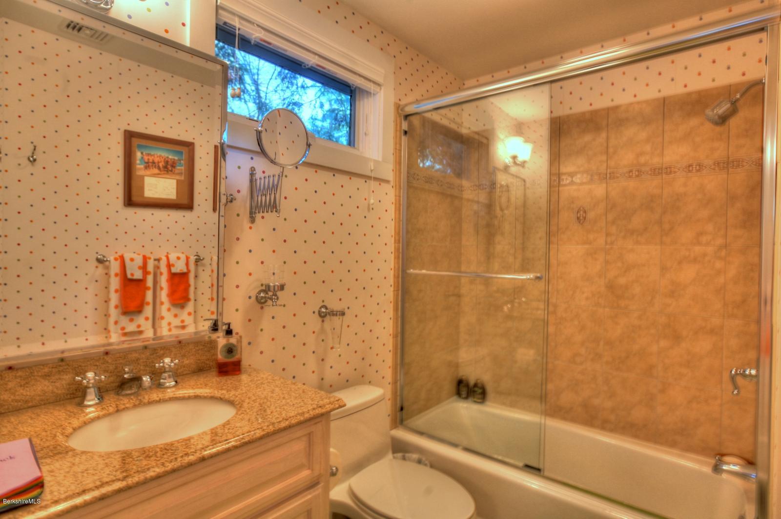 34 Bidwell Road Monterey, MA 01245 - Photo 19 of 37 a bathroom with a granite countertop sink toilet and shower