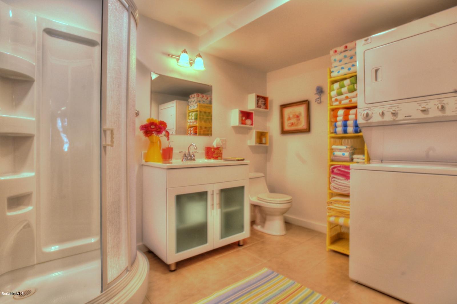 34 Bidwell Road Monterey, MA 01245 - Photo 26 of 37 a bathroom with a toilet and a sink
