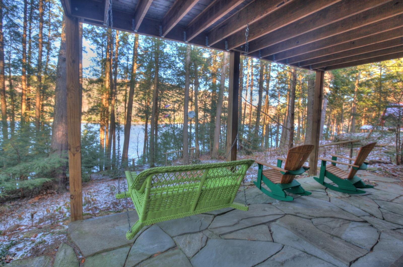 34 Bidwell Road Monterey, MA 01245 - Photo 27 of 37 a view of a chairs and table in the patio