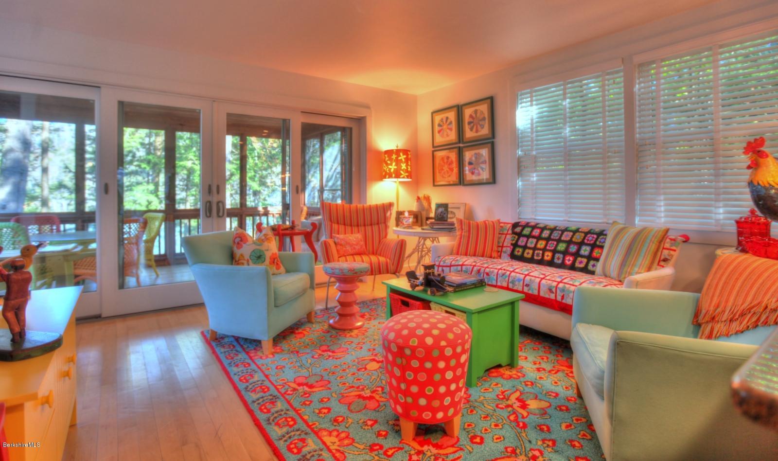 34 Bidwell Road Monterey, MA 01245 - Photo 7 of 37 a living room with furniture and a large window