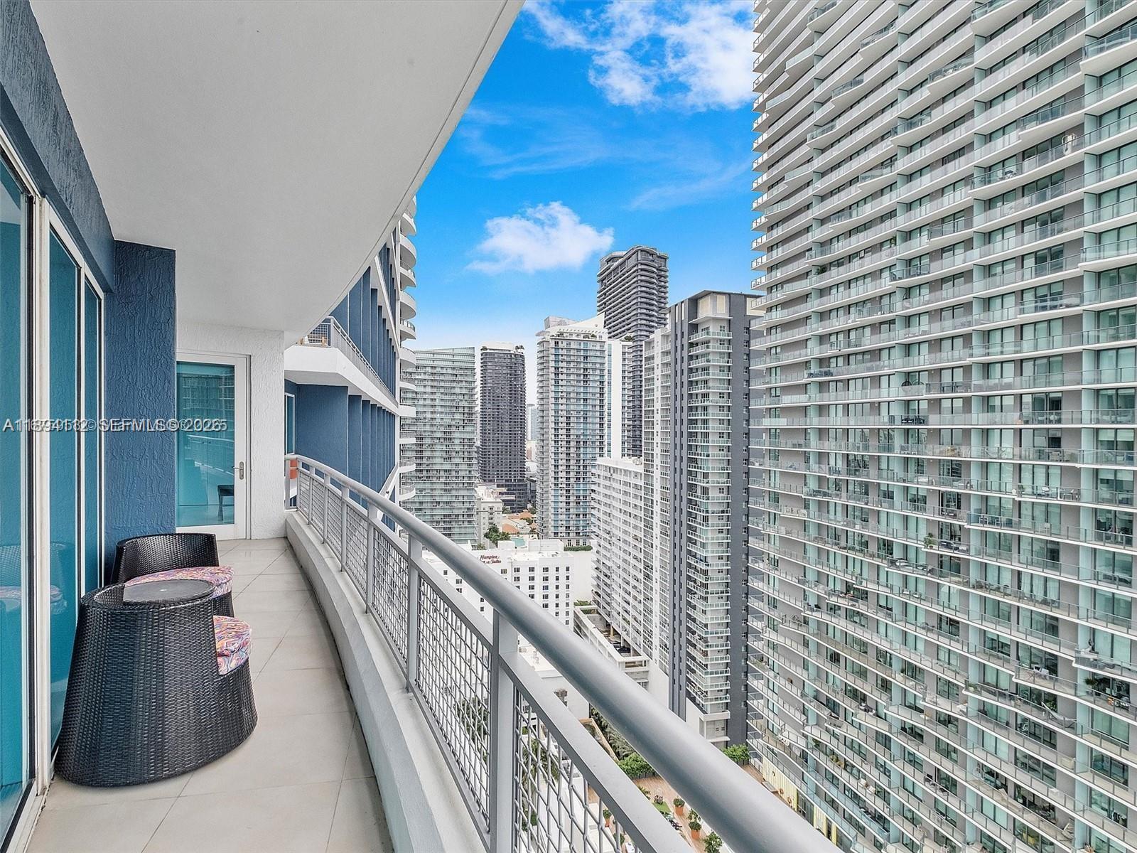 60 Southwest 13th Street, Unit 2500 Miami, FL 33130 - Photo 3 of 18 a balcony with street view