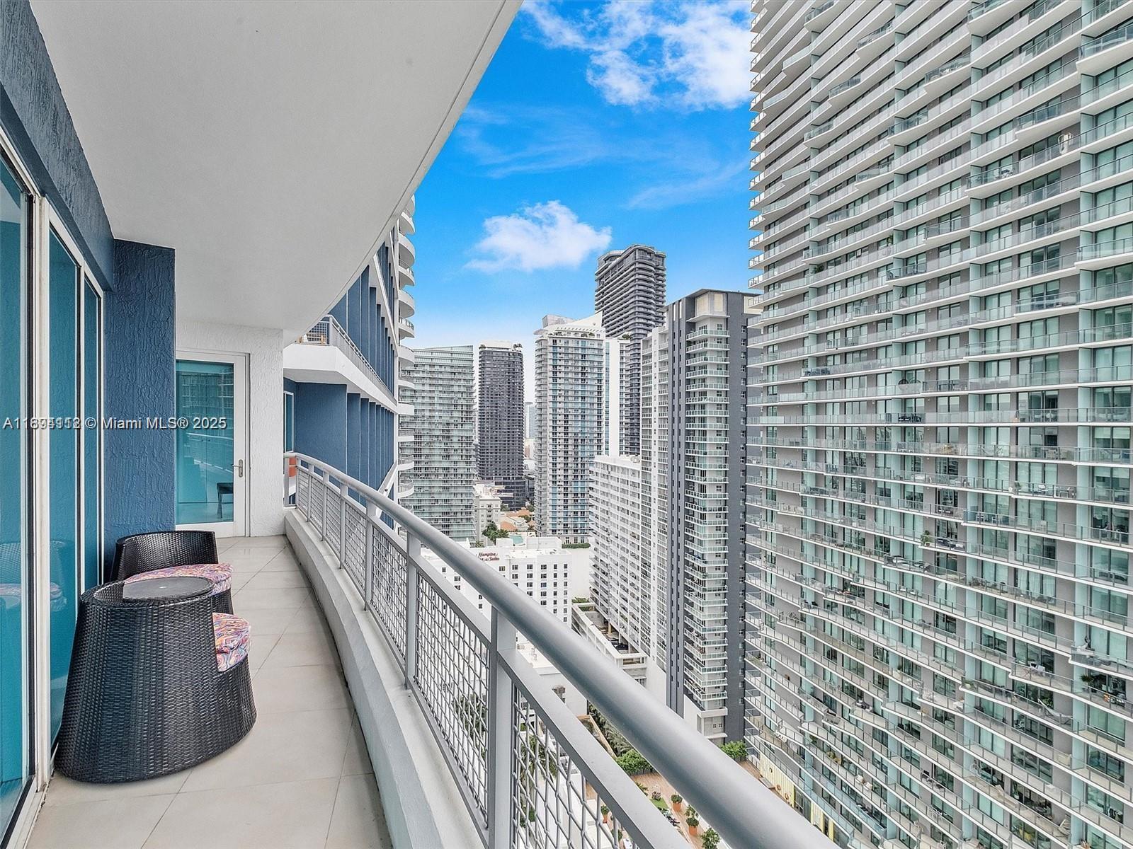 60 Southwest 13th Street, Unit 2500 Miami, FL 33130 - Photo 9 of 18 a balcony with street view