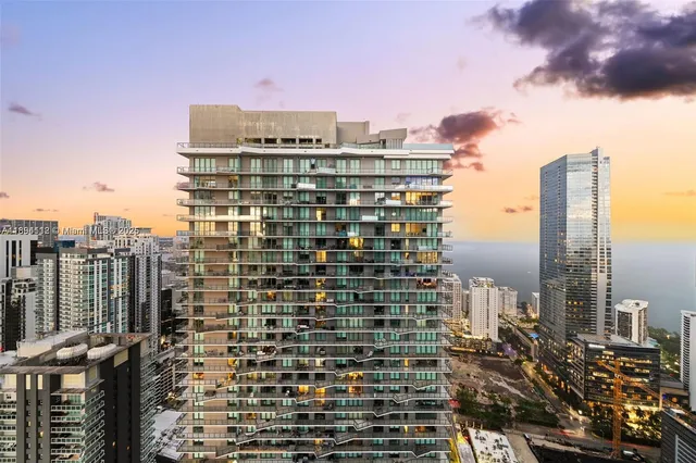 a view of a city with tall buildings