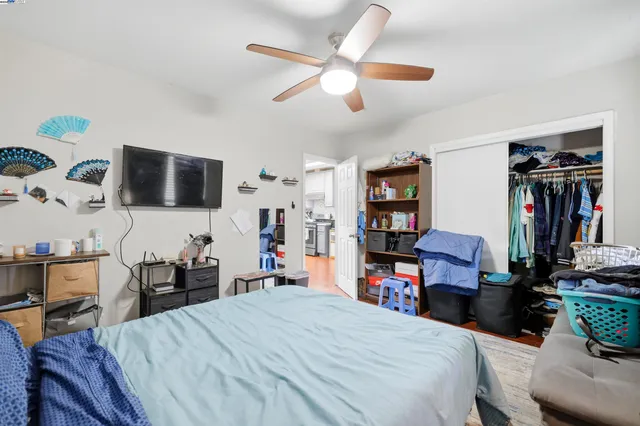 a bedroom with a bed and furniture