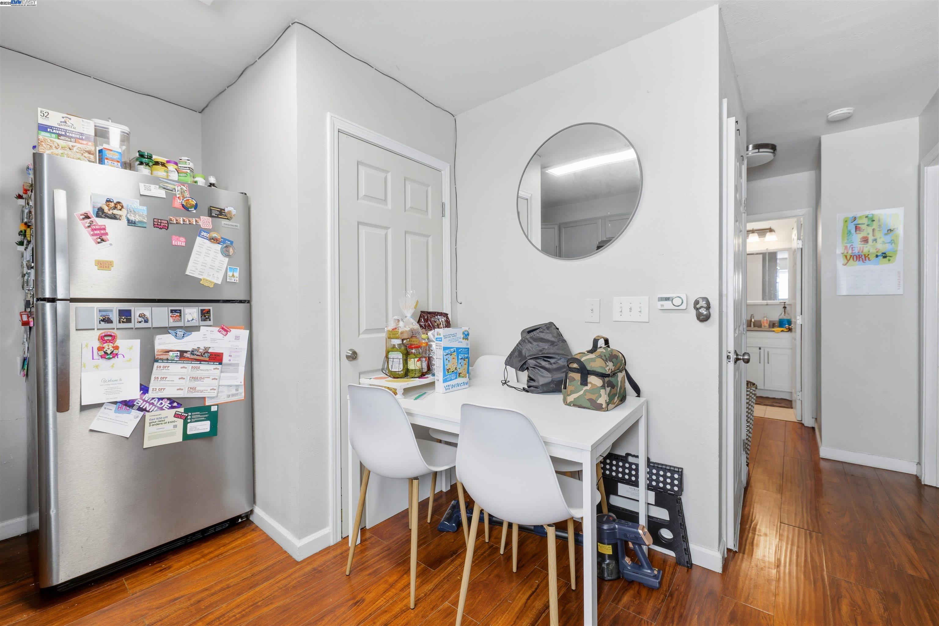 1040 Delacy Avenue Martinez, CA 94553 - Photo 36 of 52 a dining room with furniture and wooden floor