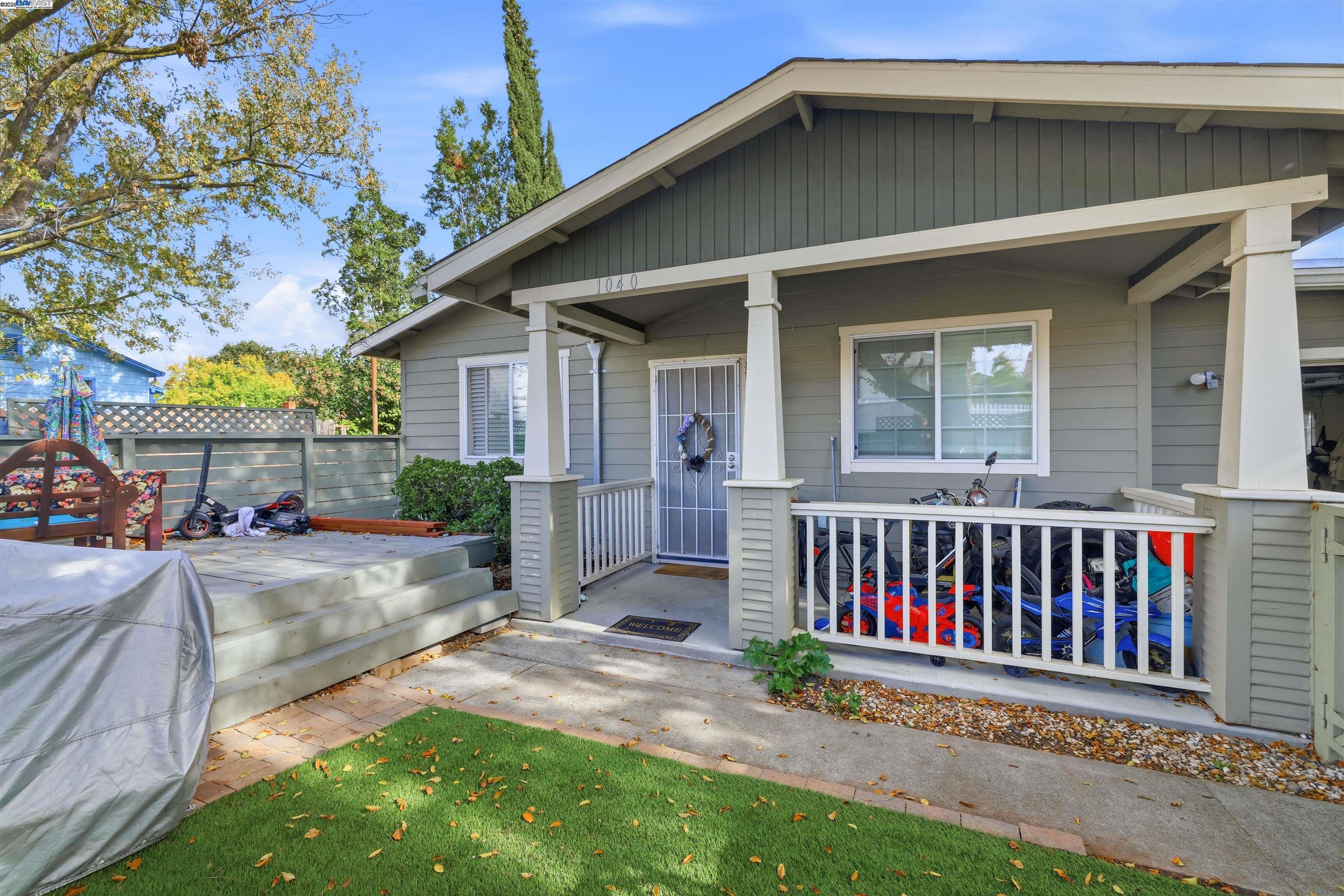1040 Delacy Avenue Martinez, CA 94553 - Photo 4 of 52 a view of a house with a yard and potted plants