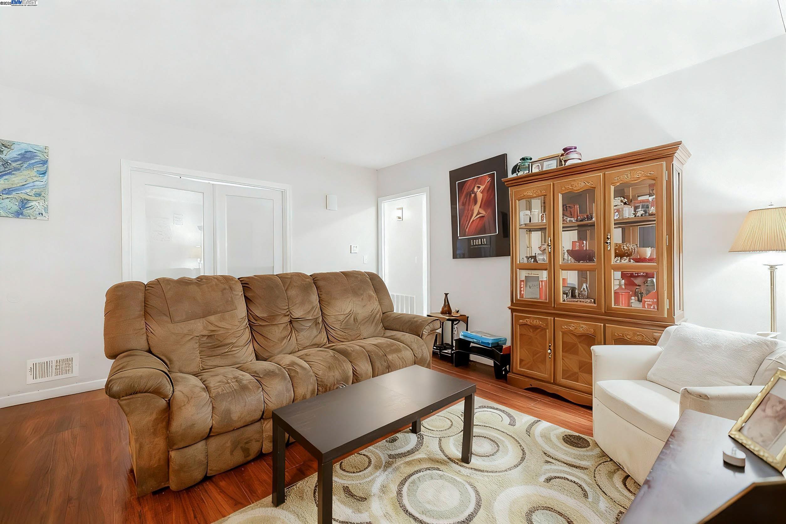1040 Delacy Avenue Martinez, CA 94553 - Photo 9 of 52 a living room with furniture and a window
