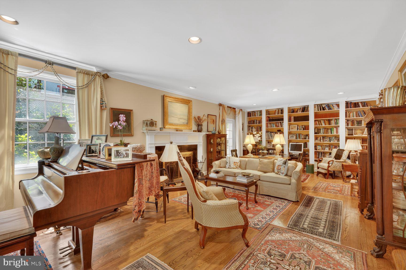 2260 48th Street Northwest Washington, DC 20007 - Photo 4 of 45 Elegant entry level living room with fireplace