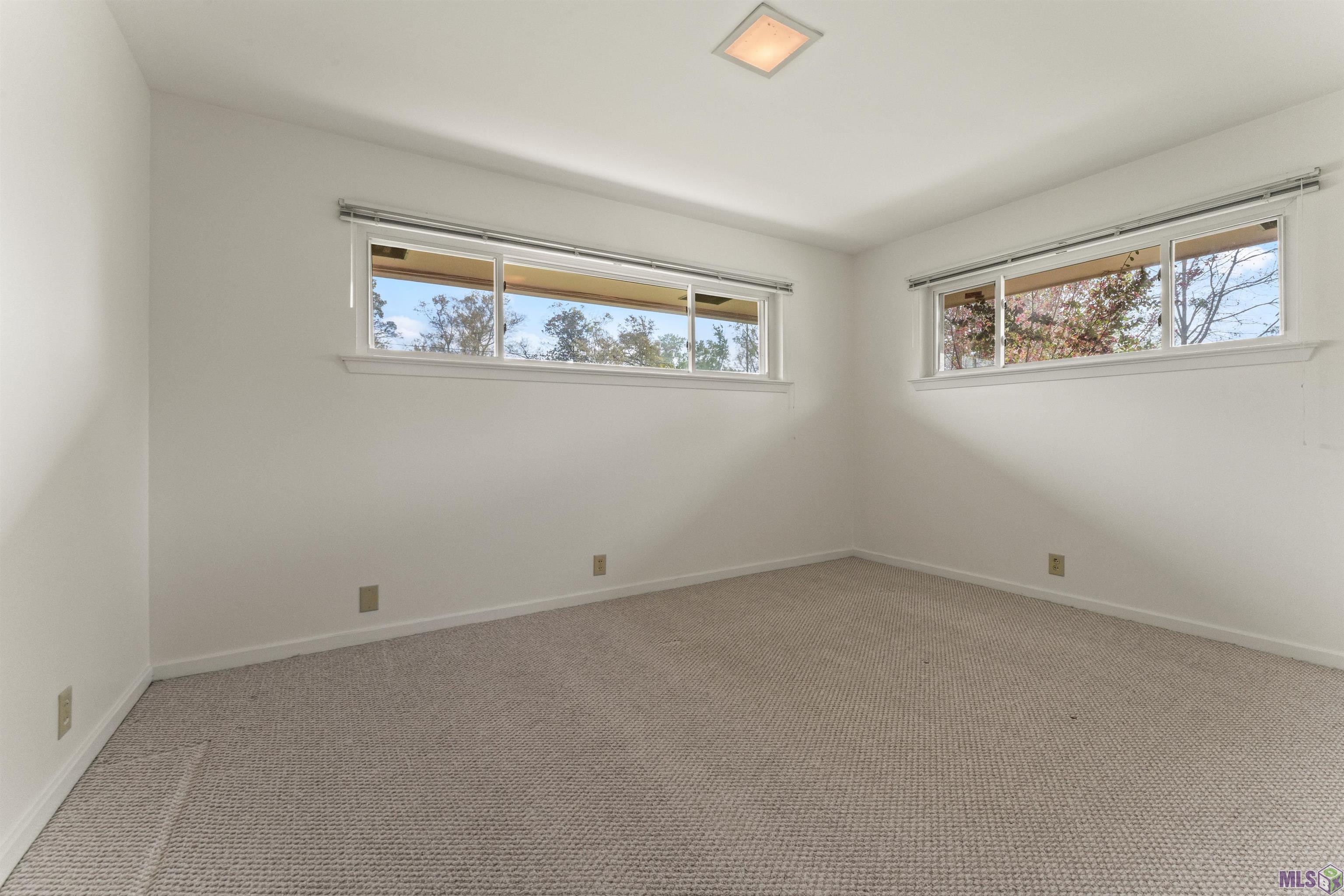 1135 West Lakeview Drive Baton Rouge, LA 70810 - Photo 16 of 27 Front Bedroom