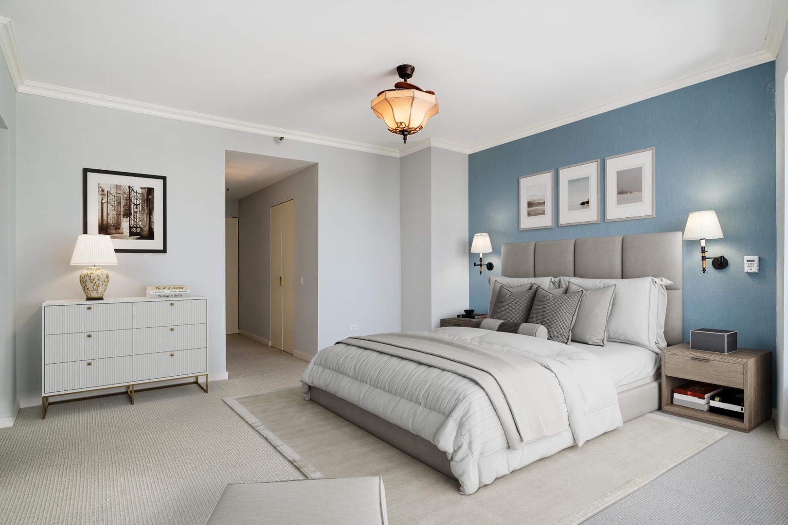 57 East Delaware Place, Unit 3202 Chicago, IL 60611 - Photo 13 of 32 a bedroom with a bed and a chandelier