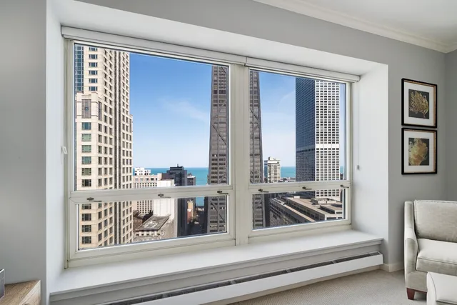 a view of a living room and a balcony